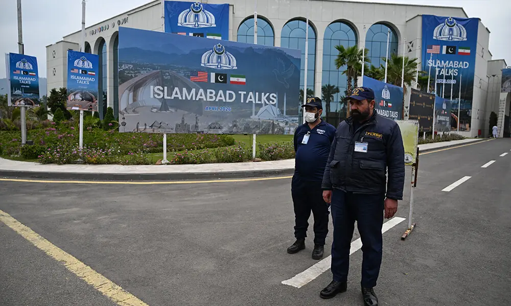 Private security personnel stand at the media centre ahead of US&ndash;Iran peace talks in Islamabad on April 11, 2026. Photo: AFP