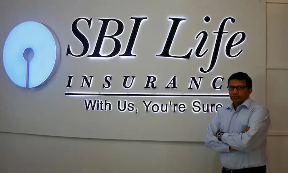 Gopikrishna Shenoy, Chief Investment Officer of SBI Life Insurance, poses next to the company’s logo after an interview with Reuters in Mumbai, India, November 6, 2017. File Photo: Reuters Gopikrishna Shenoy, Chief Investment Officer of SBI Life Insurance, poses next to the company’s logo after an interview with Reuters in Mumbai, India, November 6, 2017. File Photo: Reuters