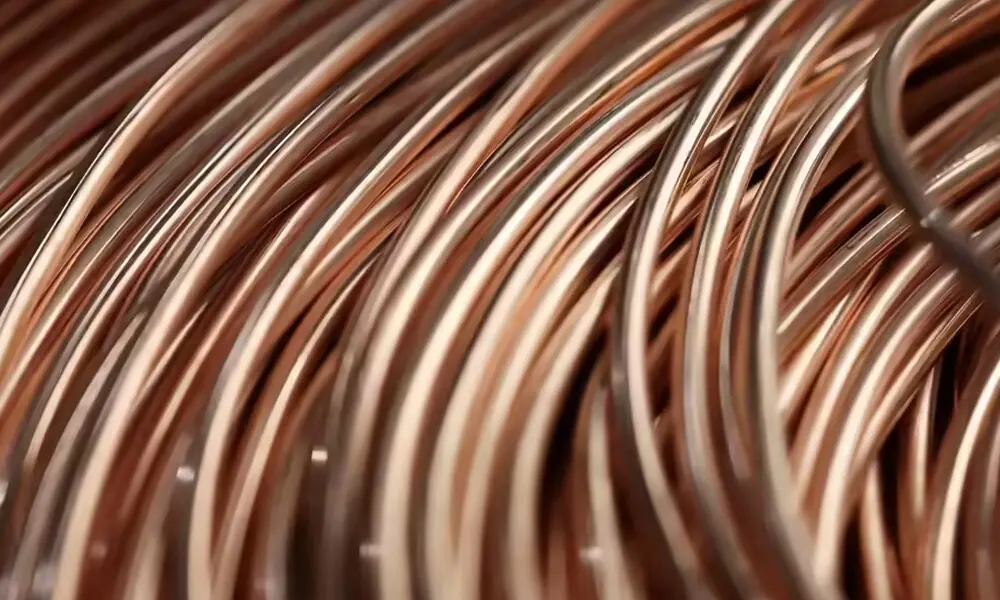 Copper hits near two-week high, aluminium hovers around four-year peak ...