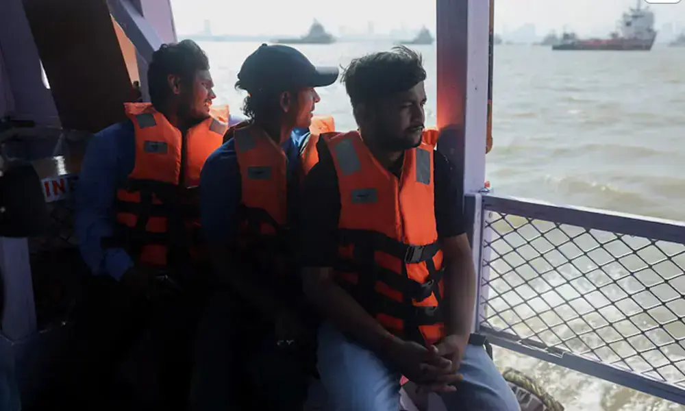 Anant Singh Chauhan and Tithi Chiranjeevi, Indian seafarers who were stuck in Iran during the conflict travel on a ferry in Mumbai, India, May 6, 2026. REUTERS Anant Singh Chauhan and Tithi Chiranjeevi, Indian seafarers who were stuck in Iran during the conflict travel on a ferry in Mumbai, India, May 6, 2026. REUTERS