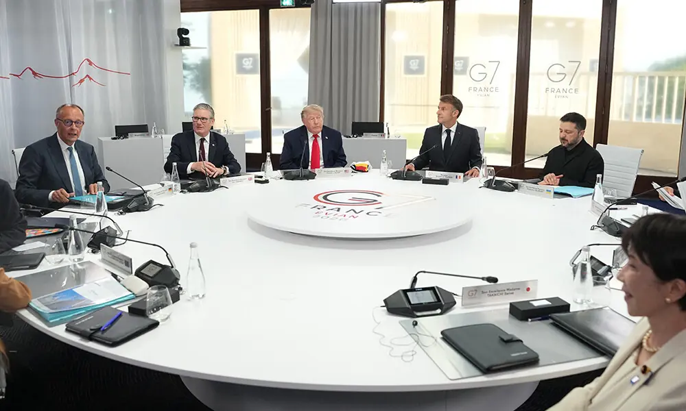 (From L) Germany's Chancellor Friedrich Merz, Britain's Prime Minister Keir Starmer, US President Donald Trump, France's President Emmanuel Macron, Ukraine's President Volodymyr Zelensky and Japan's Prime Minister Sanae Takaichia attend a working session at the G7 summit in Evian-les-Bains, central-eastern France on June 16, 2026. Photo: AFP