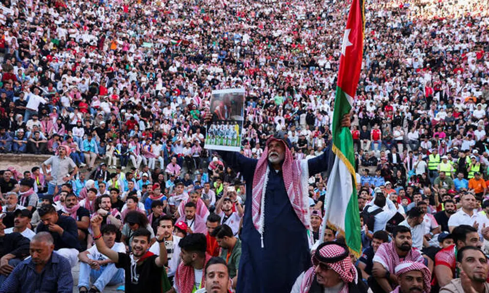 Jordanian fans react while watching the FIFA World Cup match between Jordan and Algeria at the Roman Theatre in Amman, June 23, 2026. Reuters