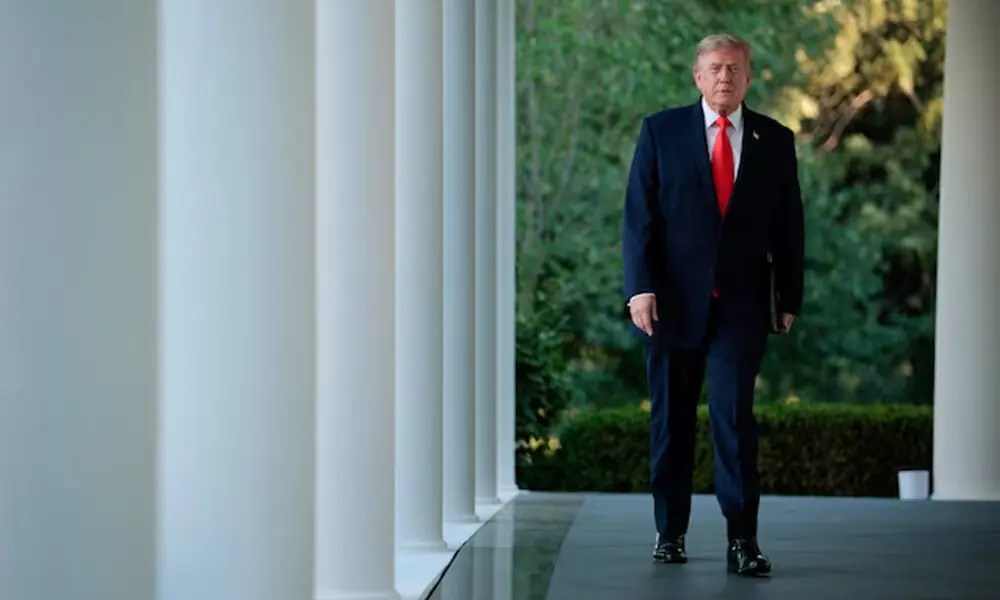 US President Donald Trump walks to address guests as he hosts a dinner with farmers in the Rose Garden of the White House in Washington, DC, US, June 25, 2026. Reuters