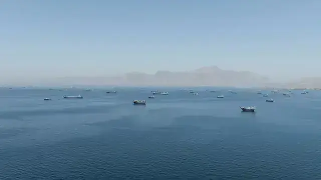 A drone view shows vessels sailing through the Strait of Hormuz, as seen from Musandam, Oman, May 25, 2026. - Photo: Reuters