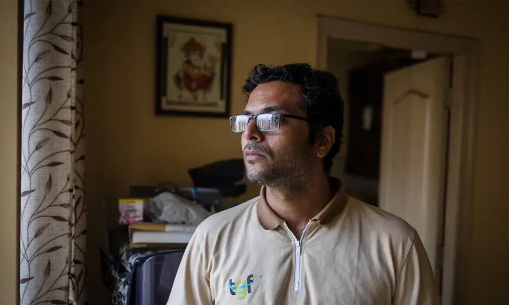 Dev Kotak, a reporter with the television channel Times Now, who was assaulted at the ongoing protest site of Cockroach Janata Party (CJP), poses for a picture inside his house in Noida, India, July 23, 2026. REUTERS