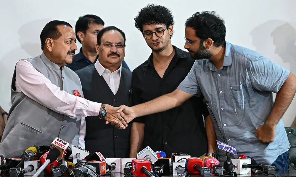 Cockroach Janta Party (CJP) spokespersons Ashutosh Ranka (R) and Saurav Das (2R) greet India's Minister of State for Atomic Energy Jitendra Singh (L) and Health Minister JP Nadda after their meeting in New Delhi on July 25, 2026, following the resignation of the country's Education Minister Dharmendra Pradhan amid the ongoing protests at Jantar Mantar over alleged NEET exam irregularities. Photo: AFP Cockroach Janta Party (CJP) spokespersons Ashutosh Ranka (R) and Saurav Das (2R) greet India's Minister of State for Atomic Energy Jitendra Singh (L) and Health Minister JP Nadda after their meeting in New Delhi on July 25, 2026, following the resignation of the country's Education Minister Dharmendra Pradhan amid the ongoing protests at Jantar Mantar over alleged NEET exam irregularities. Photo: AFP