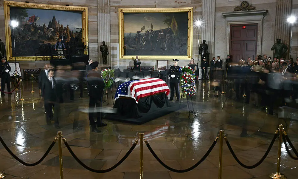 People file past the casket as they pay their respects during a Congressional tribute to late US Senator Lindsey Graham at the US Capitol in Washington, DC, on July 28, 2026. Photo: AFP