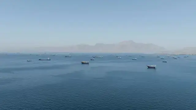 A drone view shows vessels sailing through the Strait of Hormuz, as seen from Musandam, Oman, May 25, 2026. - Photo: Reuters