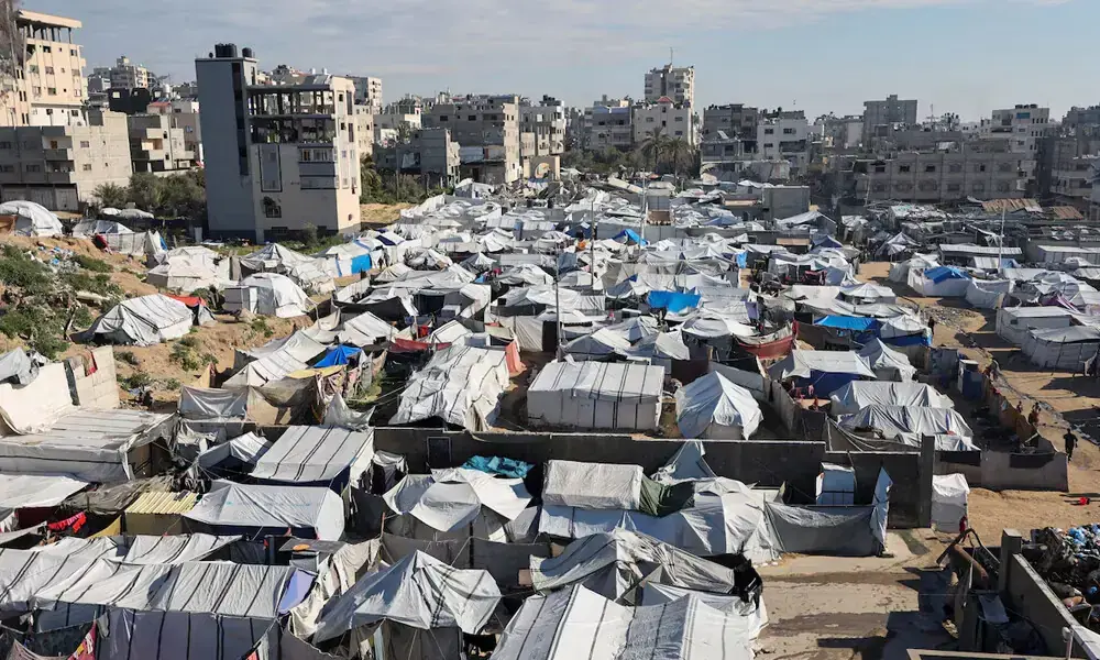 Palestinians displaced during the two-year Israeli offensive, shelter at a tent camp in Gaza City, March 1, 2026. File Photo: Reuters Palestinians displaced during the two-year Israeli offensive, shelter at a tent camp in Gaza City, March 1, 2026. File Photo: Reuters