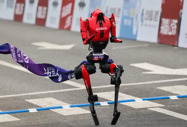 A Lightning humanoid robot by Honor crosses the finish line of the second Beijing E-Town Half Marathon and Humanoid Robot Half Marathon in Beijing, China April 19, 2026. Photo: Reuters
