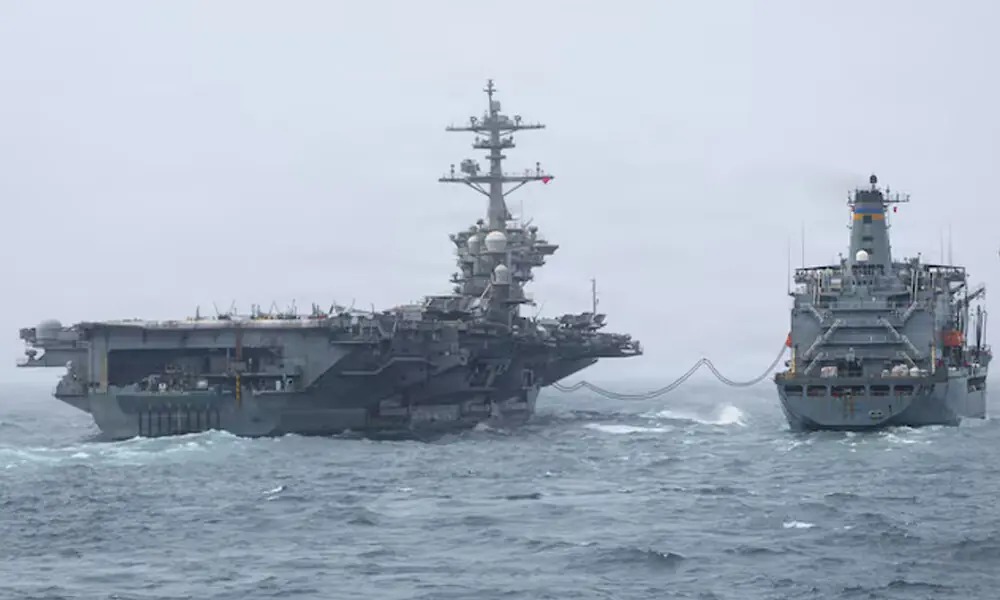 The US Navy Nimitz-class aircraft carrier USS Abraham Lincoln, which is supporting US military operations in the war with Iran, conducts a replenishment-at-sea with fleet replenishment oiler USNS Henry J. Kaiser, August 16, 2026. REUTERS