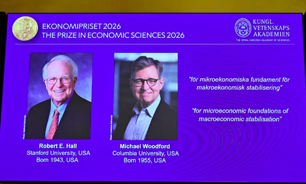 US academics Robert Hall and Michael Woodford. Photo: Reuters US academics Robert Hall and Michael Woodford. Photo: Reuters