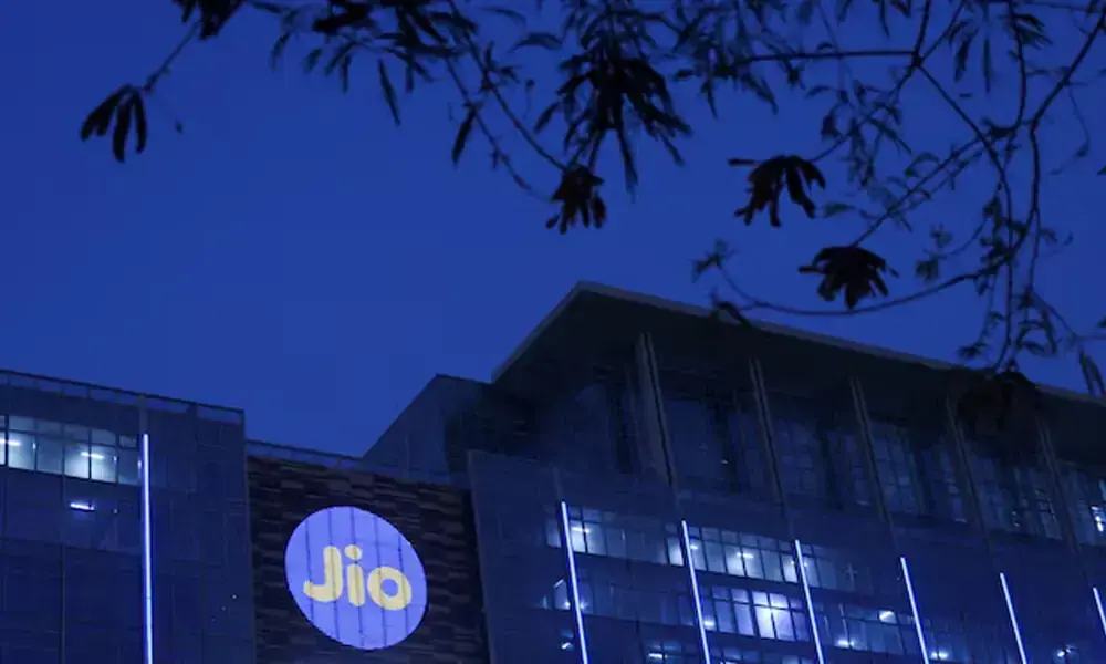 Reliance Industries Jio telecoms logo is displayed on the Jio World Convention Centre building on a street in Mumbai, India, March 24, 2026. REUTERS