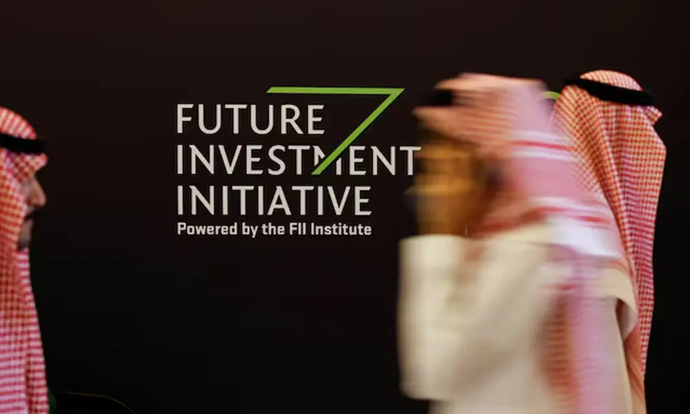 Delegates walk at the venue of the Future Investment Initiative (FII) in Riyadh, Saudi Arabia October 29, 2024. REUTERS Delegates walk at the venue of the Future Investment Initiative (FII) in Riyadh, Saudi Arabia October 29, 2024. REUTERS
