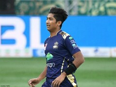 Pakistan's Hasnain banned from bowling for illegal action