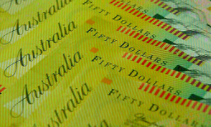 Australia, NZ dollars wrong-footed by US$ rally, bonds fare better