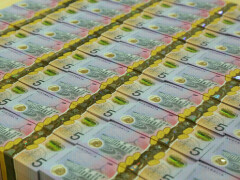 Australia, NZ dollars on a roll as markets pare back rate peaks
