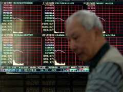 China stocks slip on decelerating Q4 data