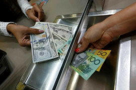 Aussie jumps, kiwi slumps after inflation data