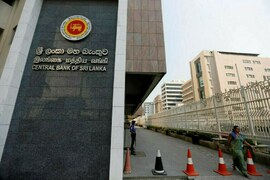 Sri Lanka says treasury running dry, cuts spending
