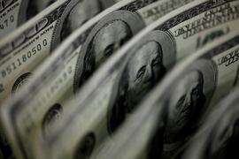 Dollar climbs against yen as BOJ affirms ultra-easy policy