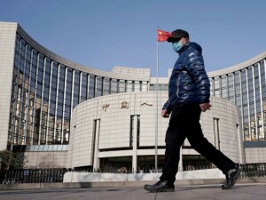 China central bank cuts key interest rate to boost economy