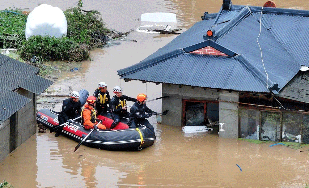 North Korea warns of flood damage after tropical storm drenches South
