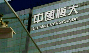 China Evergrande shares tumble 25% after wealth management staff detained