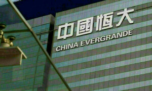 Pressure piles on Evergrande with chairman under police watch, liquidation risk