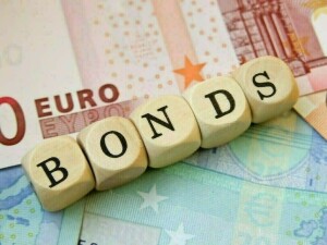 Euro zone bond yields hold steady after Monday’s rise