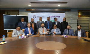 Meezan Bank, AHL launch instant top-up service for investors Meezan Bank, AHL launch instant top-up service for investors