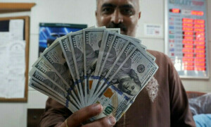 Rupee gains against US dollar amid reported crackdown