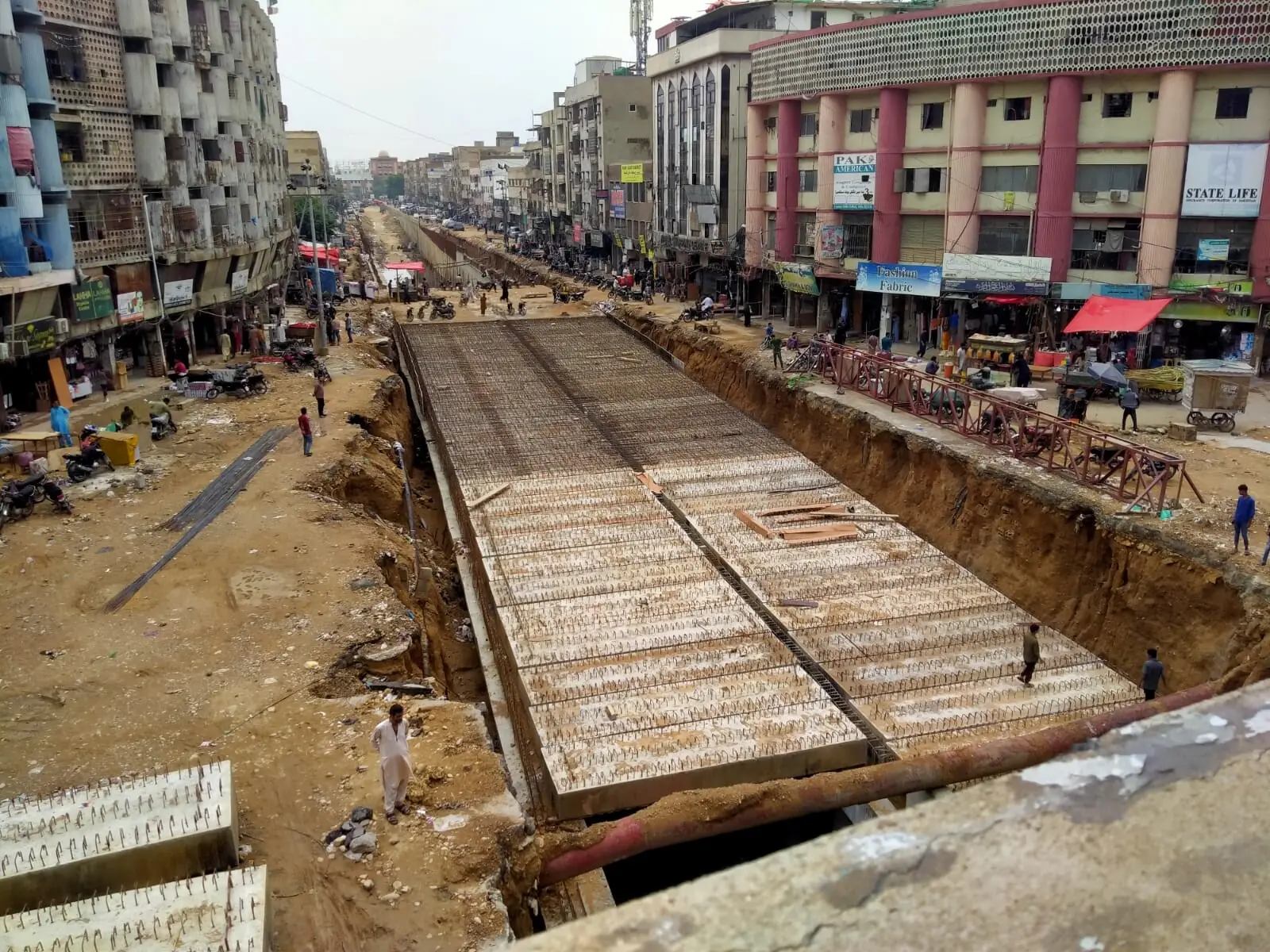 ‘We are barely surviving’: delay in Karachi’s Karimabad underpass project takes toll on nearby businesses