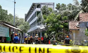 Death toll from Indonesian school collapse jumps to at least 49
