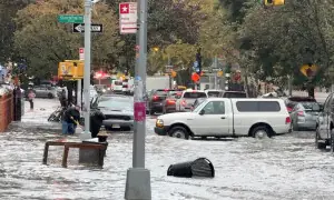 Heavy rains in New York kill two, disrupt flights