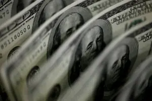 Dollar pares gains, yen tumbles