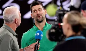 Djokovic reaches 100th Australian Open match win in hunt for 25th Grand Slam