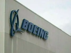 Boeing reports 1st annual profit since 2018 on asset sale