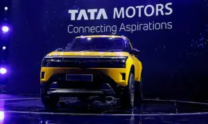 Tata Motors posts sharp fall in quarterly profit on demerger, labour-code charge