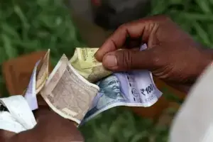 Indian rupee leans on RBI to soften impact of flows, weak Asian cues