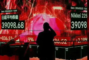 Shares slip in Asia as metals melt, earnings loom