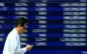 Asia stocks rise despite lingering AI worries, oil down after US-Iran talks