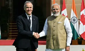 India, Canada aim for trade pact by year-end, strike uranium deal
