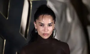 Saint Laurent presents lace dresses and power suits at Paris Fashion Week show