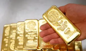 Gold set for weekly drop as oil price surge weighs on rate-cut hopes