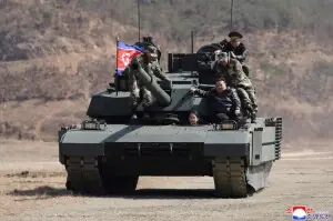 North Korean leader’s teenage daughter drives tank in latest public appearance