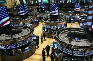 Wall Street gains ground on healthcare stocks rally, oil retreat