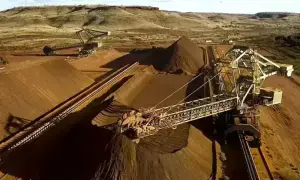 Iron ore inches higher after six-day slide