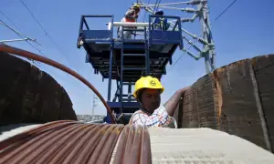 Copper climbs on China data; nickel set for best month in 2 years