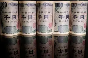 Japan spends more than $30 bn to prop up yen: reports
